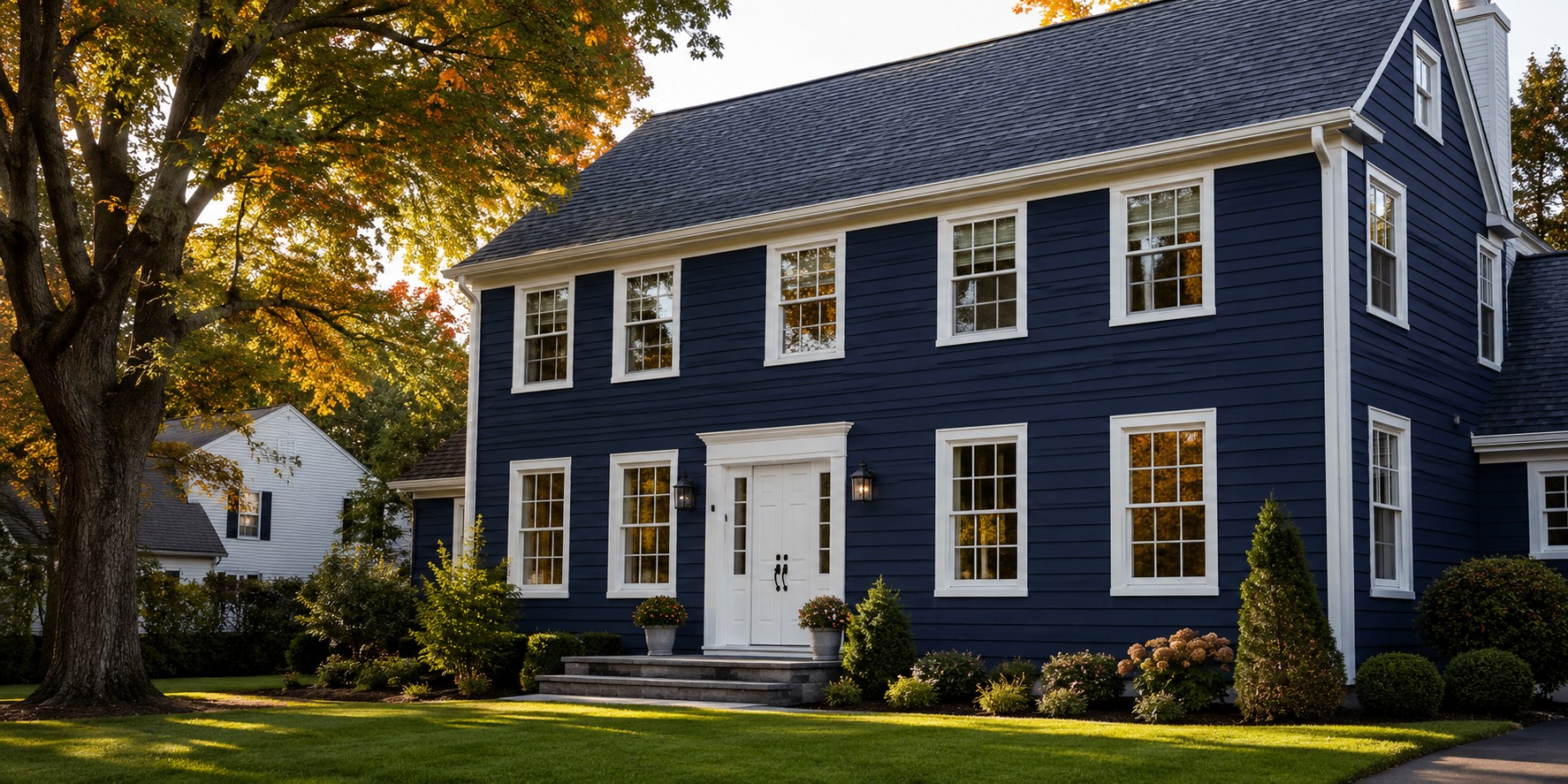 Navy James Hardie fiber cement siding, white trim